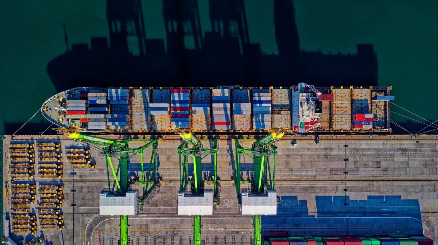 Container vessel loading freight at an international shipping port